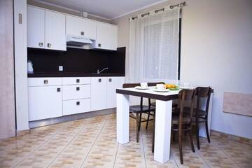 Фото номера Апартаменты с видом на озеро Проживание в семье 4 Pory Roku Apartamenty Domki Pokoje г. Nadole 5